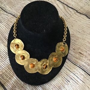 Gold Circle necklace with animal prints in the circles